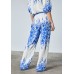 Sister Point - Ella-pa53 Losse broek ecru blauwe bloemenprint. Sister Point - Ella-pa53 Losse broek ecru blauwe bloemenprint.